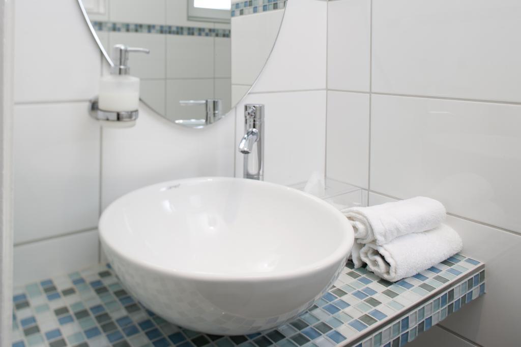 Hotel Parkfrieden 티멘도르프스트랜드 객실 사진